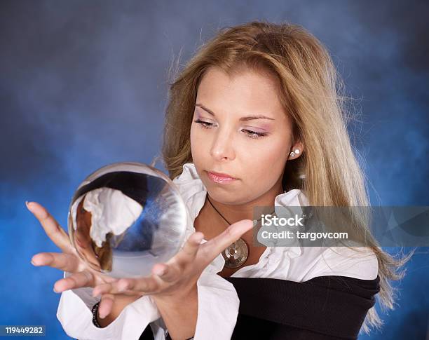 Mystical Woman Posing With A Crystal Ball Stock Photo - Download Image Now - Fortune Teller, Women, Fortune Telling