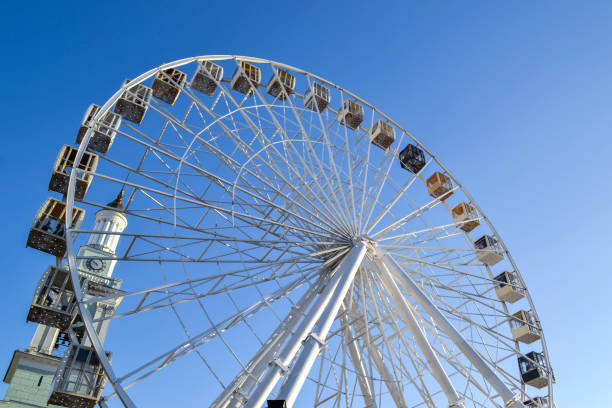istock Ferris wheel against a blue sky background. 1194494368