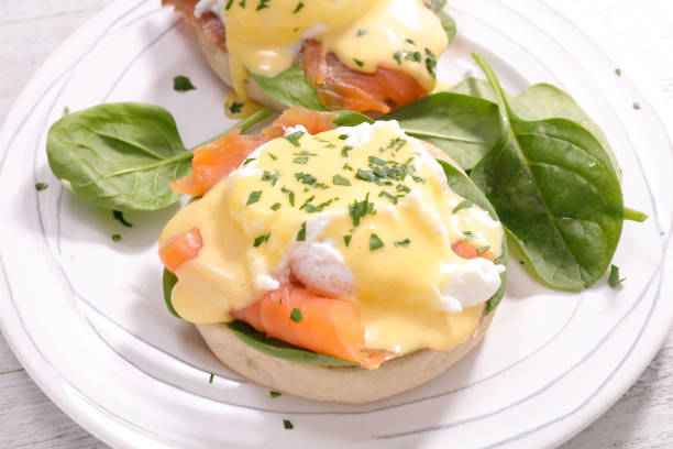 istock muffin with poached egg, sauce and salmon 1194494389