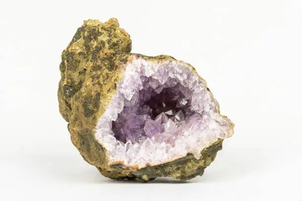 detailed view into the crystals of an amethyst geode