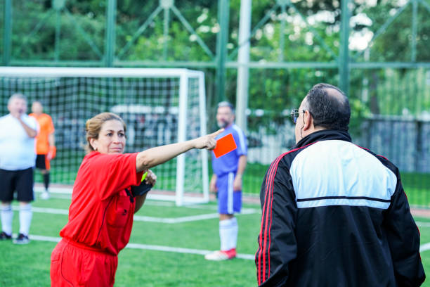 istock Arbrito woman expels team technician with red card 1194495692