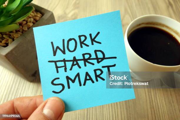 Work Smart Motivational Reminder Handwritten On Sticky Note Stock Photo - Download Image Now