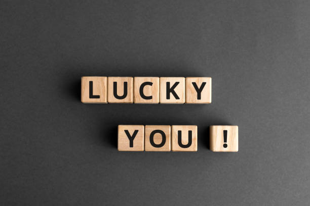 istock lucky you - phrase words from wooden blocks with letters 1194500861