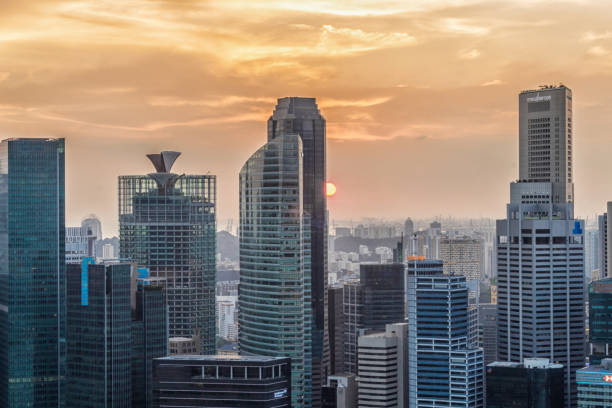istock dramatic sunset  sky  and clouds over Singapore city centre 1194501503