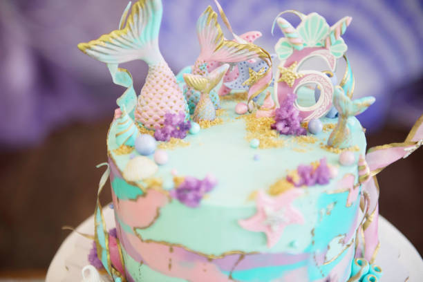 istock cake decorated with mermaid tails. 1194502398
