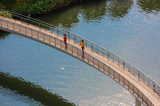 Singapore-12 OCT 2019: people walking on punggol waterway landscape bridge