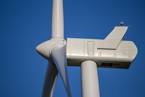 O'Neill,  Nebraska, US July 22, 2019 Wind Farm In Nebraska Farm Land Wind Power Turbine Up Close