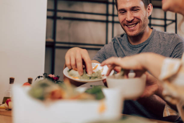 istock Couple composting food leftovers 1194505472
