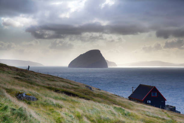 istock Koltur island, a vew from Vagar, Faroe 1194506787