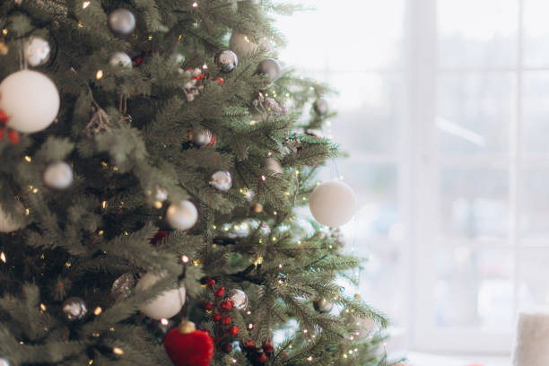 istock Christmas tree with toys and lights 1194509149