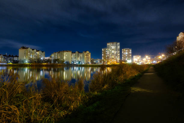 Night landscape of the lakeside estate with reflections in water