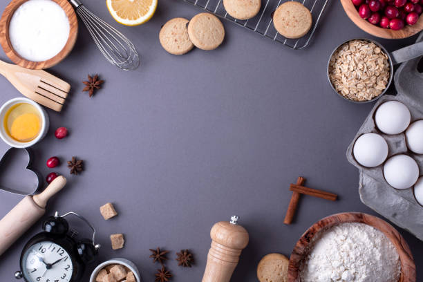 istock Baking and cooking ingredients on dark grey background 1194513723