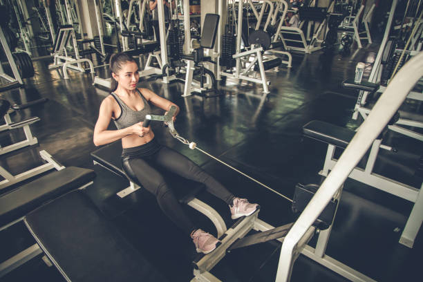 istock Sexy woman exercise with the exercise machine. 1194514638