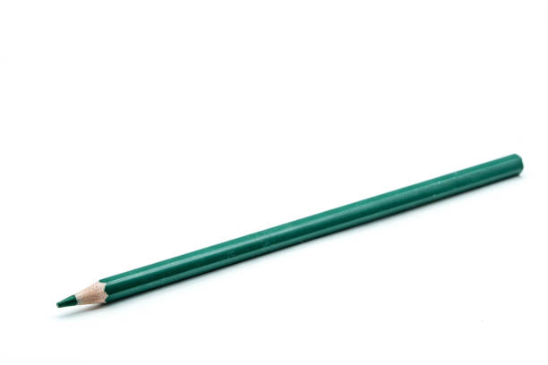Heap of different graphite pencils painted in various colors with and without eraser attachments on ends for sale, top view from the end sides close-up in selective focus