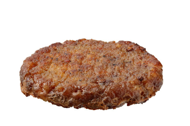 istock freshly grilled burger meat isolated on white background. top view 1194515215