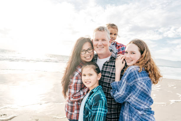 istock Family on the beach 1194523690
