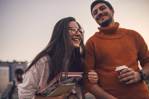 istock Beautiful young student couple spending time together dating 1194523892