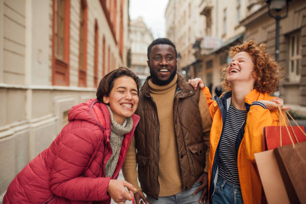 istock Three beautiful people shopping for Christmas 1194525561