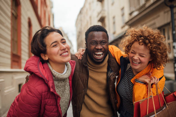 istock Three beautiful people shopping for Christmas 1194525580