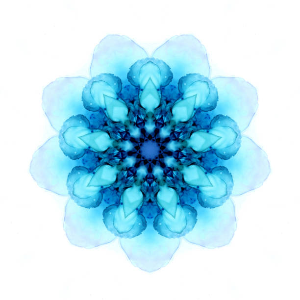 Delicate watercolor snowflake pattern isolated on white background. Kaleidoscope effect. Delicate watercolor snowflake pattern in blue tones isolated on white background. Alcohol ink art with kaleidoscopic effect. Raster illustration. Perfect for polygraphy design. kaleidoscope pattern photos stock pictures, royalty-free photos & images