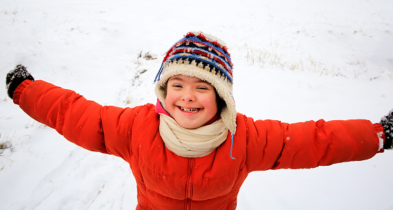 Portrait of beautiful little girl in the winter