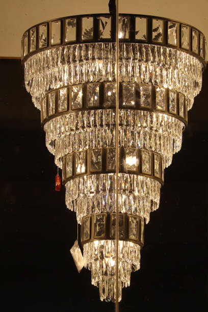 istock Cone Shaped Chandelier Hang on Roof With Black Background 1194532248