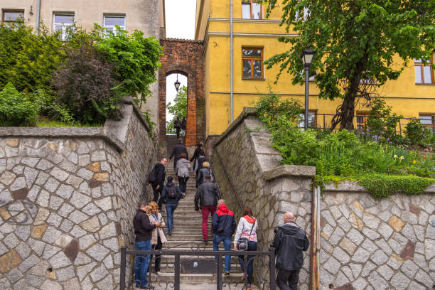 view of the dominican gate, sandomierz, poland. - eyes narrowed imagens e fotografias de stock