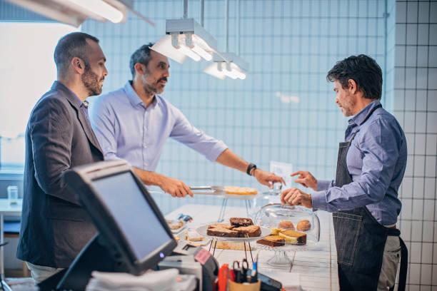 istock Mature man   in the pastry shop 1194532946