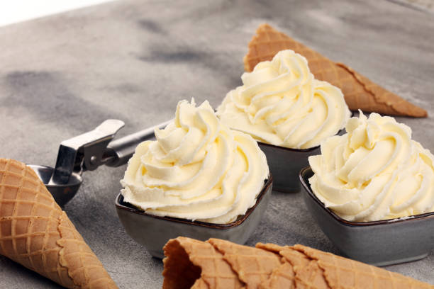 istock Vanilla soft served ice cream tasty sundae dairy ice cream on rustic background 1194534120