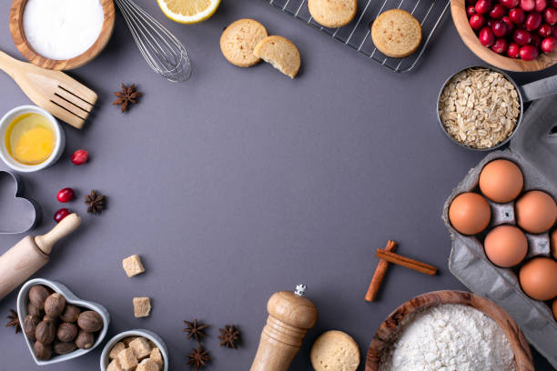 istock Baking and cooking ingredients on dark grey background 1194534435