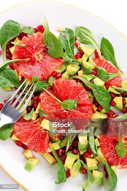 Fresh Salad With Grapefruit Avocado And Pomegranate Seeds Stock Photo - Download Image Now