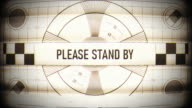 istock Please stand by text on retro TV screen, no signal, no transmission, silence 1194540219