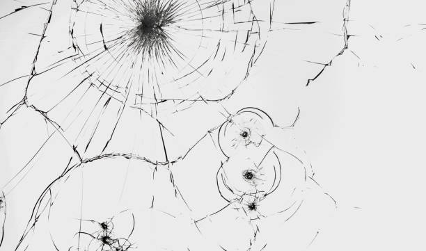 istock glass crack hole from a ball on a white background 1194543400