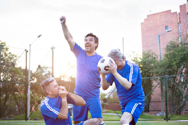 istock Older men celebrating he scored a goal 1194544063