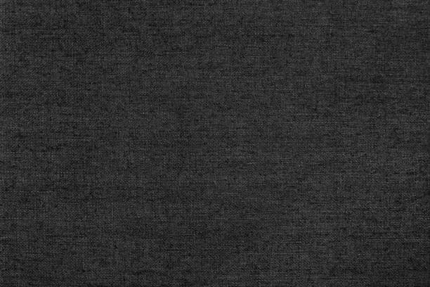 istock Dark black white linen canvas. The background image, texture. 1194544324