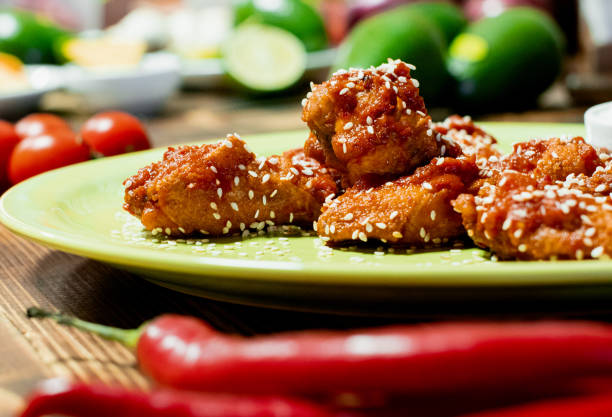 istock plate of chicken wings on wooden table 1194545896