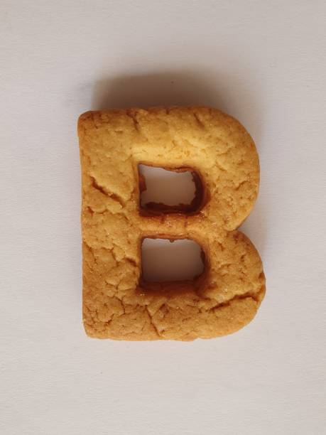 istock baked cookie forming the letter B 1194546013