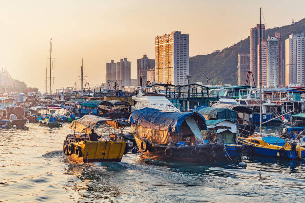 Sunset view of the harbor in Aberdeen Bay. Aberdeen. Sunset view of the harbor in Aberdeen Bay. Aberdeen. aberdeen hong kong photos stock pictures, royalty-free photos & images