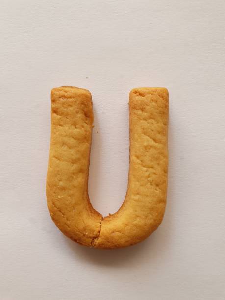 istock baked cookie forming the letter U 1194546796