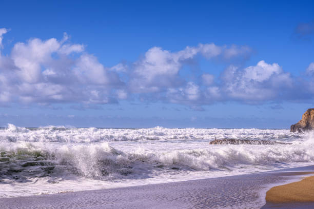 istock Turbulent Ocean Waves On Beach Off California Coast 1194547362