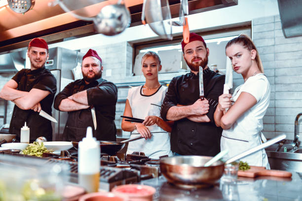 istock Culinary Experts As Part Of Modern Kitchen Team 1194549008