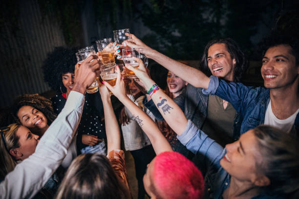 istock Multi-ethnic group of friends in pub. 1194550347