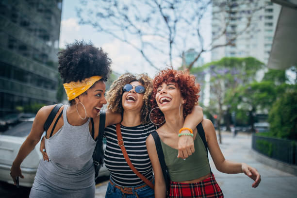istock Three young women walking outdoors 1194551859