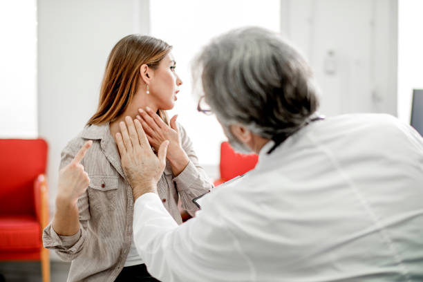 Young woman with sore throat Young woman have problem with sore throat or thyroid gland. lymph node photos stock pictures, royalty-free photos & images
