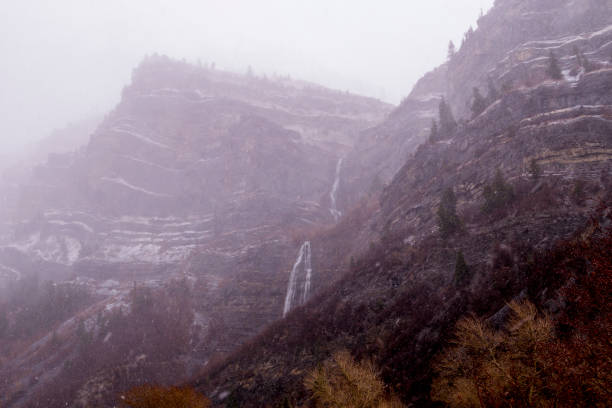 istock Waterfall Descending from a Mountain During a Snowstorm 1194552859