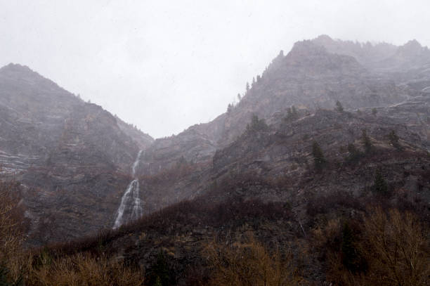 istock Waterfall Descending from a Mountain During a Snowstorm 1194552864