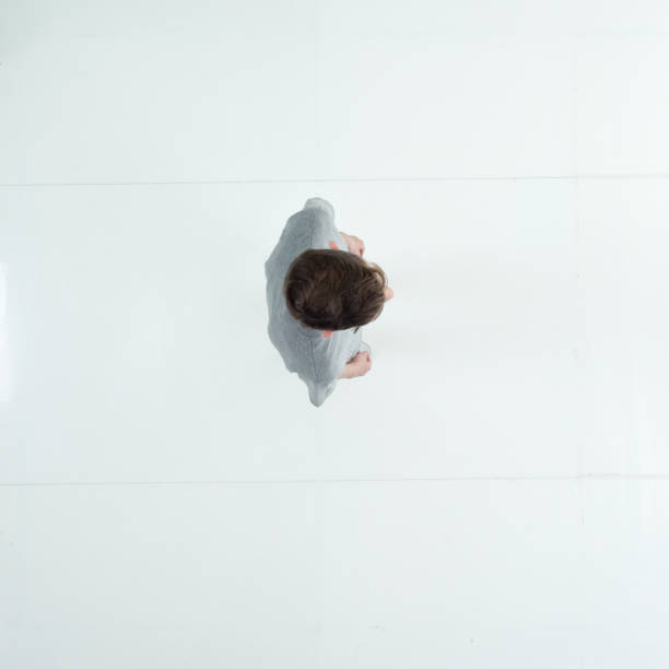 Full length / one man only / one person / directly above view / aerial view of 12-13 years old adult handsome people caucasian male / young men teenage boys / boys standing in front of white background wearing t-shirt / shirt longitud completa / un hombre solamente / una persona / directamente por encima de la vista / vista aérea de 12-13 años adultos guapos personas caucásicas hombres / hombres jóvenes adolescentes / niños de pie frente al fondo blanco usando camiseta / c