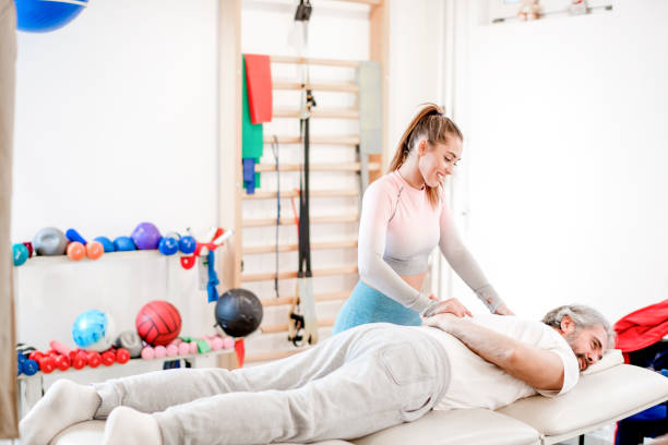 istock Senior man in physical therapy 1194565598