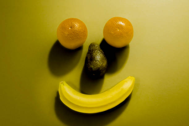 istock funny faces made with fruits and vegetables 1194567694