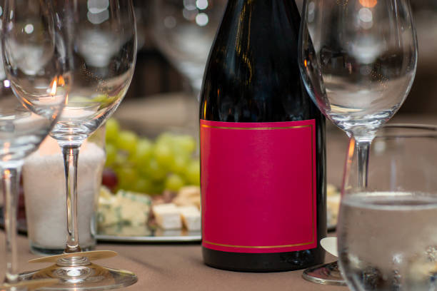 istock Bottle of Red Wine Cheese Assortment for Snack. 1194571565